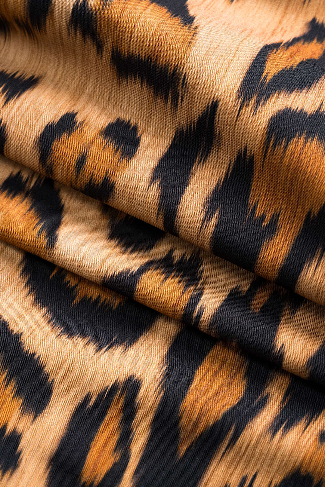 Sally – Bold Leopard Print Midi Dress